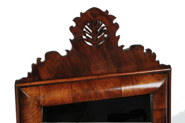 Queen Anne figured walnut crested cushion mirror, c. 1705, England 